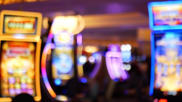 Live casino studio with multiple dealer tables and professional lighting setup